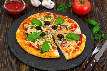 Pizza with Mushroom, Cheese, Mozzarella, Olives and Basil