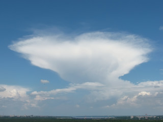 Fototapeta na wymiar Giant anvil cloud Cumulonimbus incus