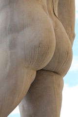 back of the marble statue with white buttocks
