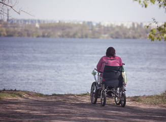 Naklejka premium woman sitting in a wheelchair