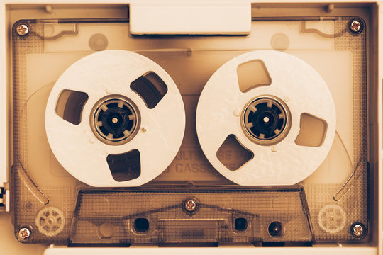 vintage audio tape compact cassette, sepia tone