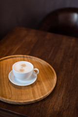 cup on wooden background