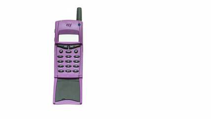 Old purple mobile phone isolated on white background