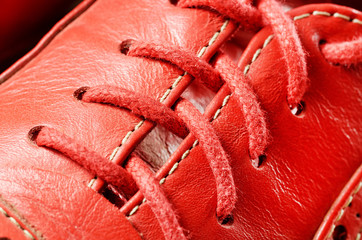 Red shoe lace closeup image