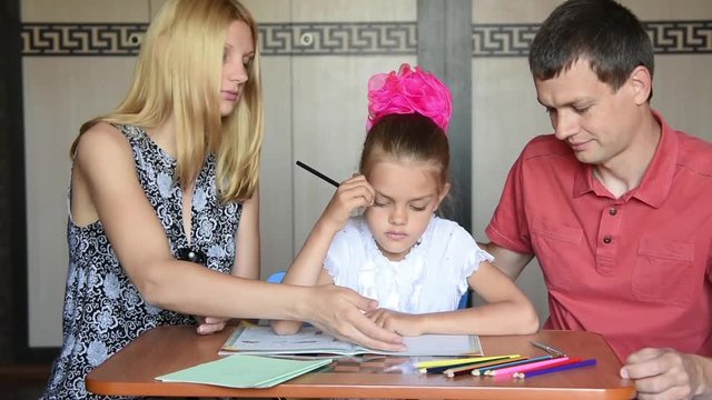 Parents corrected workbook which says their daughter schoolgirl