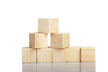 Obraz premium Wooden toy cubes isolated on a white