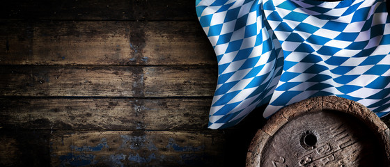 Oktoberfest rustic background with Bavarian flag
