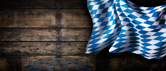 Bavarian flag over an old wooden wall banner - obrazy, fototapety, plakaty