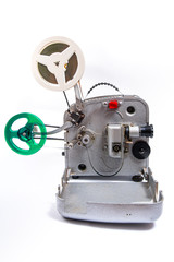 Vintage motion picture film projector and reel of motion picture