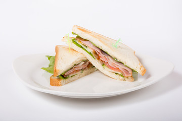 Fresh sandwiches on a white plate
