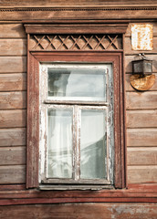 Old wooden window on the ancient house