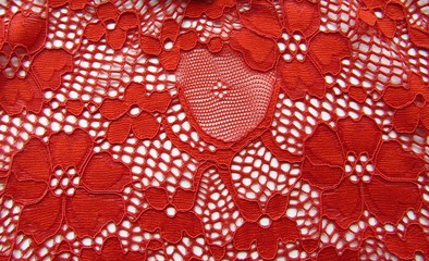 Red lace with flowers on white texture