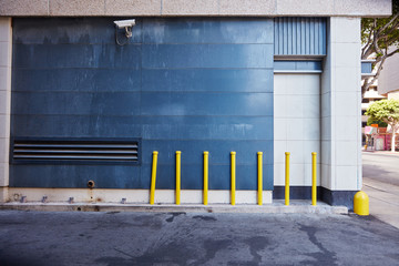 Fototapeta premium Security camera on wall in urban city