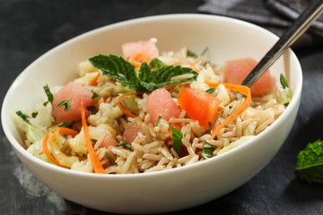 Brown rice salad / Rice salad selective focus