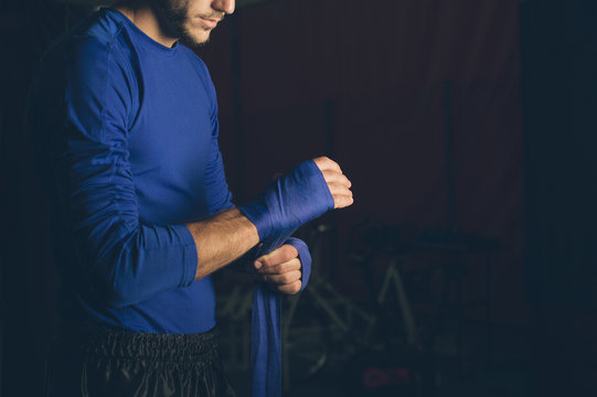 Kickboxer with bandage.