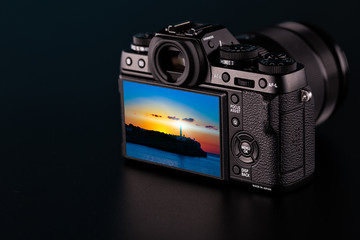 View of  Monitor modern mirrorless system camera