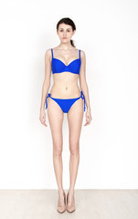 Standard model tests of young pretty woman on a white background