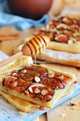 cheese pie with figs, nuts and honey