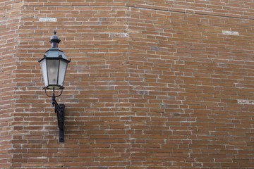 Lamp on a Brick wall