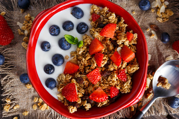 Homemade granola Breakfast with yogurt and fresh fruit berries. concepts health food