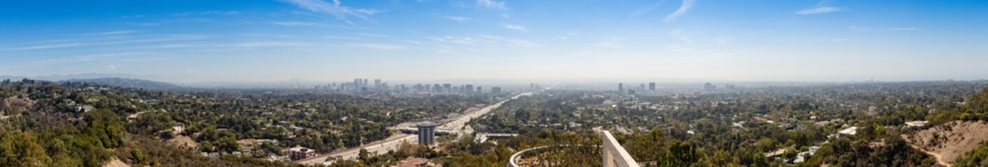 Panorama of Los Angeles skyline with sky and clouds