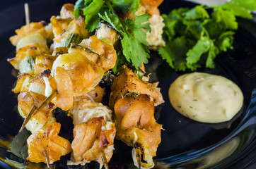 red fish grilled on skewers