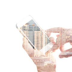 Double exposure hand using mobile phone and building in city background. © BNMK0819