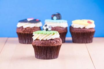 Delicious cupcakes on table