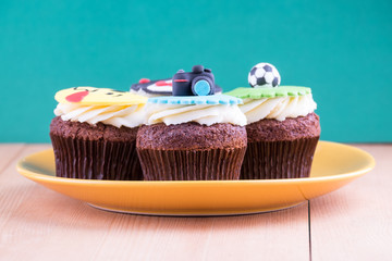 Delicious cupcakes on table