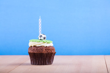 Delicious cupcake on table