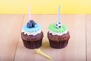 Delicious cupcakes on table