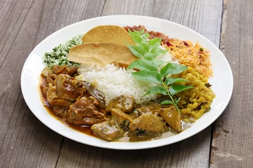 Fotobehang Assortiment sri lankan rice and curry dish  © uckyo