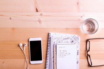 Desk with gadgets and office supplies, copy space.