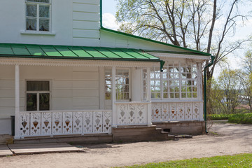 Fototapeta na wymiar White wooden veranda of the house of Leo Tolstoy in Yasnaya Polyana