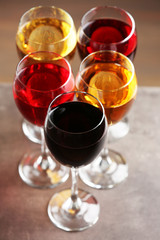 Glasses with wines of different colors on a table