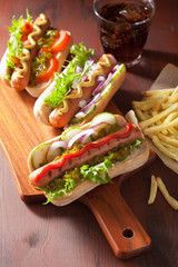 grilled hot dogs with vegetables ketchup mustard