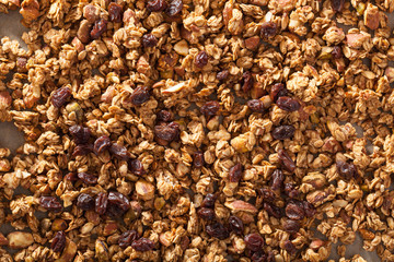 homemade healthy granola on backing paper background