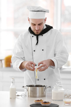 Male chef working at kitchen