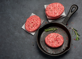Raw Ground Beef Meat Burger cutlets. Top view