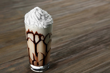 Fresh milk cocktail on wooden background