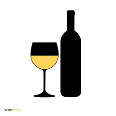 Glass and bottle of white chardonnay wine
