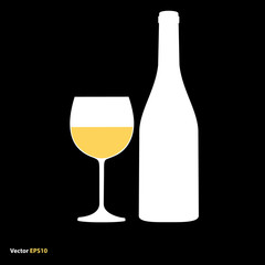 Glass and bottle of white chardonnay wine