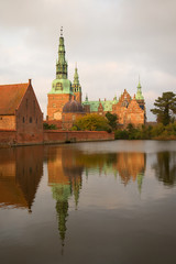 Fototapeta premium At the Frederiksborg castle, cloud november evening. Denmark