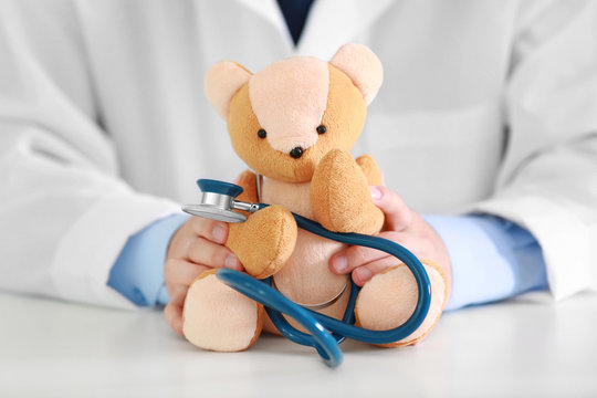 Male Doctor With Teddy Bear