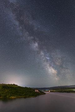 Milky way over lake Cincis in Romania