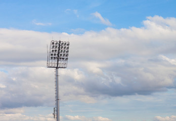 Stadium lights on sky background