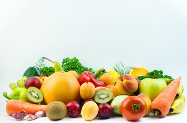 Fototapeta na wymiar Fruits and vegetables on a white background