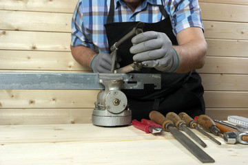 Senior carpenter working in his workshop
