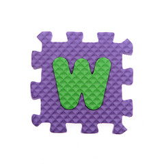 Alphabet W puzzle pieces on white background