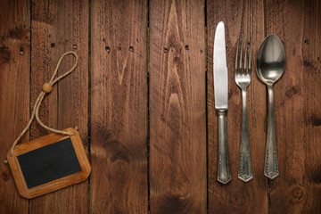 Silverware with an empty tag on a table